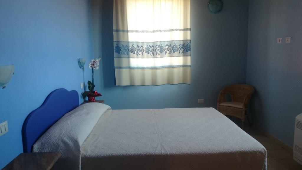 Aparthotel La Corte Dei Rei Castiadas Pokoj fotografie