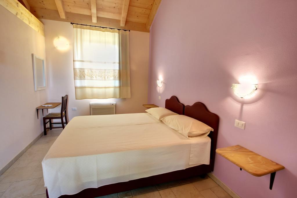 Aparthotel La Corte Dei Rei Castiadas Pokoj fotografie