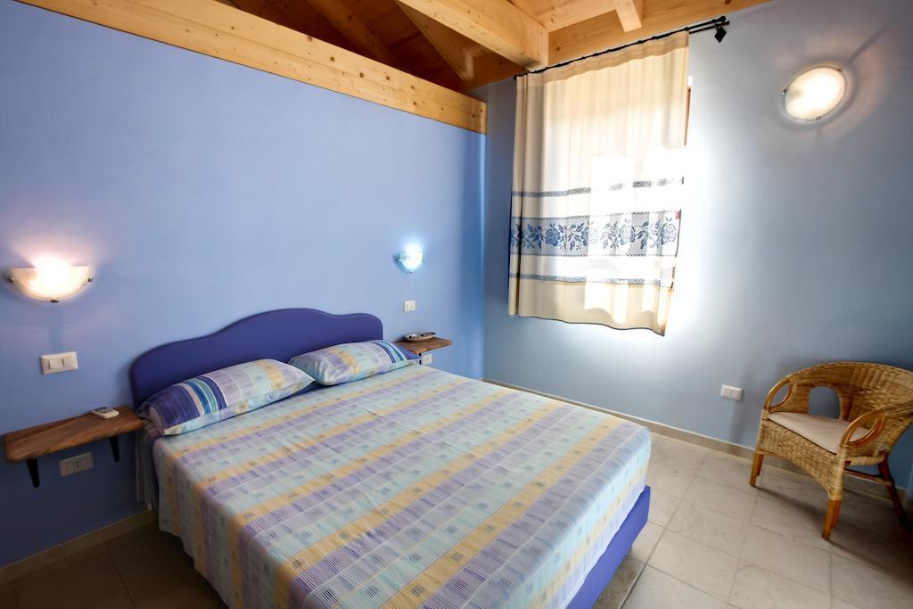 Aparthotel La Corte Dei Rei Castiadas Pokoj fotografie
