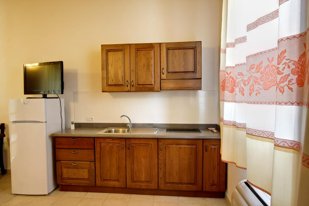 Aparthotel La Corte Dei Rei Castiadas Pokoj fotografie