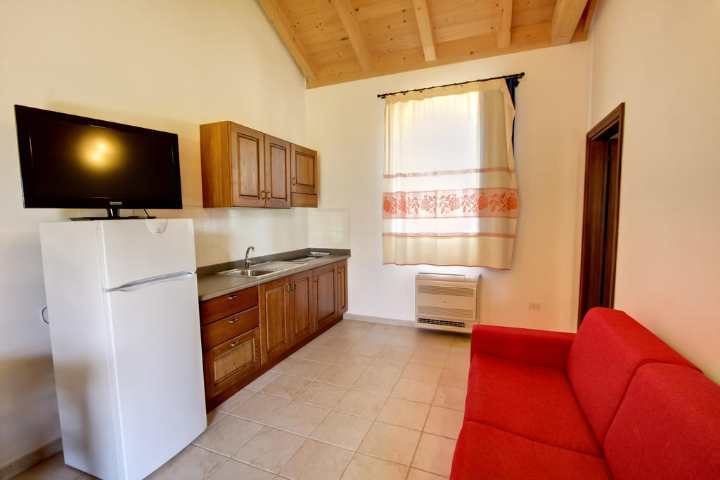 Aparthotel La Corte Dei Rei Castiadas Pokoj fotografie
