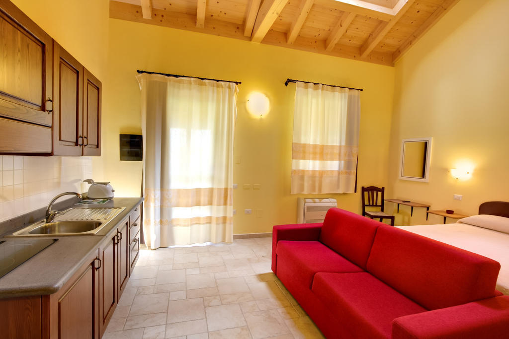 Aparthotel La Corte Dei Rei Castiadas Pokoj fotografie