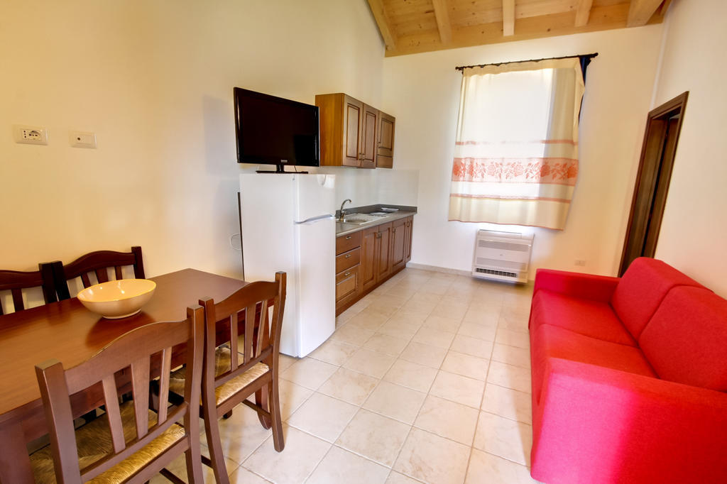 Aparthotel La Corte Dei Rei Castiadas Pokoj fotografie